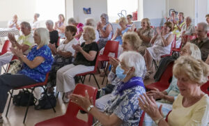 Photo of Windsor u3a members applauding presenter