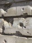 Shrapnel damage to the wall of the ‘V and A’ museum.