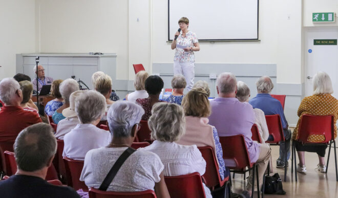 Author Bobbie Darbyshire addressing members at the August 2024 Monthly Meeting