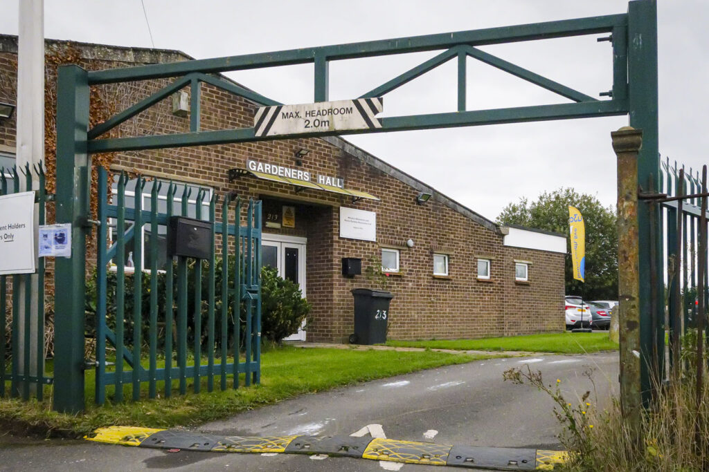 Exterior Gardeners Hall in October 2024 with u3a banner